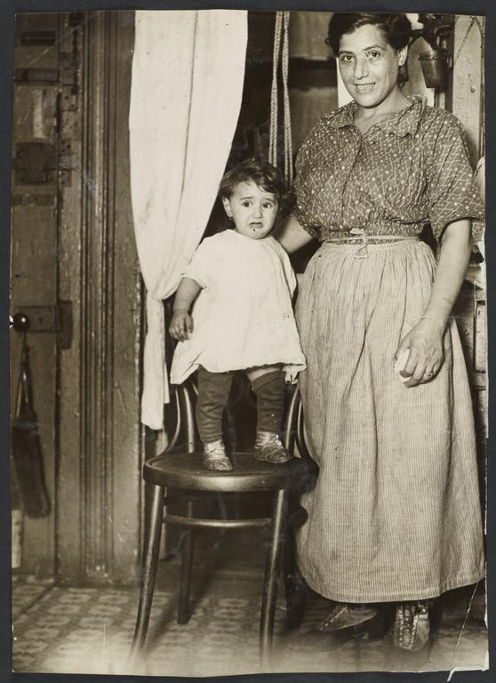 Mulberry Health Center Album -- Woman with Child on Chair