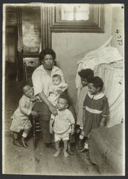 Columbus Hill Health Center Album -- Woman with Four Children and Baby