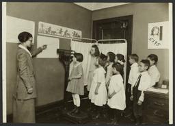 Mulberry Health Center Album -- Children Being Weighed