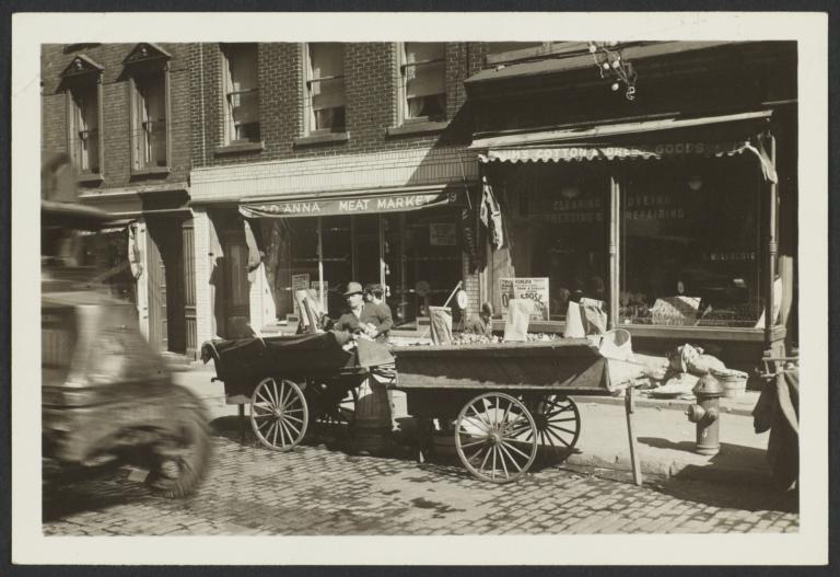 Pushcart in Front of Meat Market