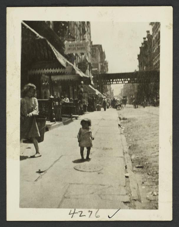 Little Girl on Sidewalk near Elevated Subway