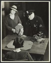 Two Women with Police Officer