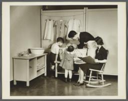 Nurses' Educational "Keep Well" Series Album -- Nurses with Two Children