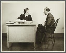 Health Examination-Men Album -- Nurse Questioning Man in Office