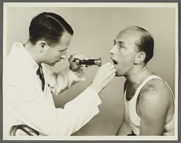 Health Examination-Men Album -- Doctor Examining Man's Mouth
