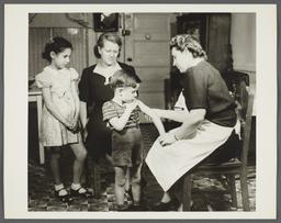 Nurse Inspecting Arm for Local Reaction to Toxoid Injection
