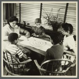 Lenox Hill, 1948-1949 Album -- Woman with Children Playing Bottle Cap Game