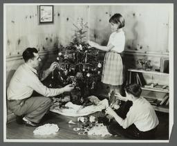 Lenox Hill, 1948-1949 Album -- Decorating Christmas Tree