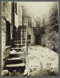 Airshaft with Boy on Stairs