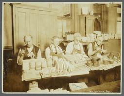 Old Men's Toy Shop Album -- Men Painting Wooden Toys